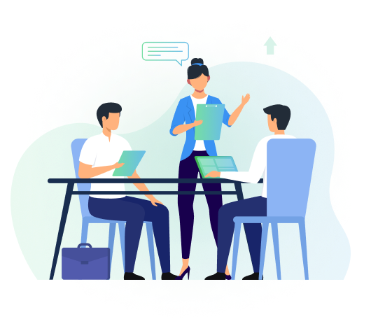 Three employees are discussing with each other; one person is standing, and two guys are sitting.